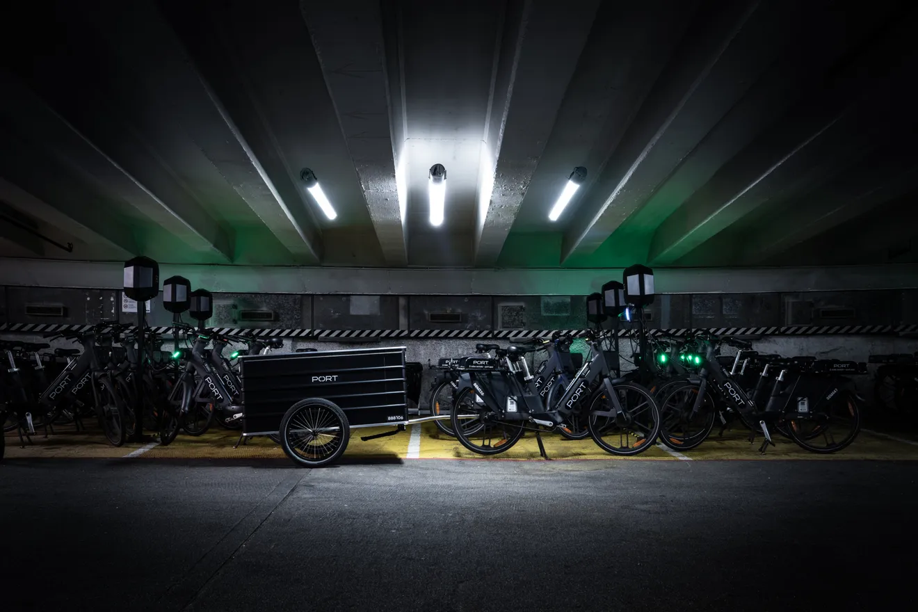 PORT fleet, including chargers, e-bikes and trailers, inside a repurposed facility
